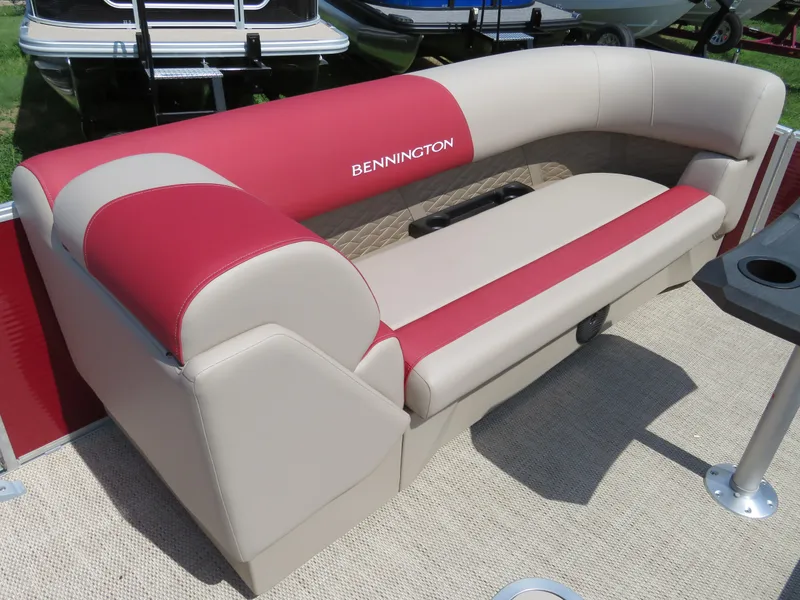 Slide: The Image of 2024 Bennington 22SSR boat with red and beige seating. - 7