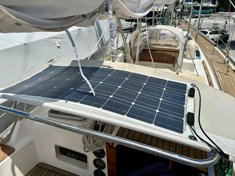 Slide: The Image of Solar panel installed on 1980 Alden 44 sailboat deck for renewable energy. - 14