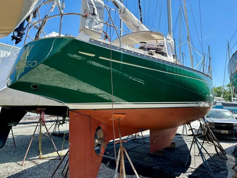 Slide: The Image of Green 1980 Alden 44 sailboat on dry dock for maintenance. - 3