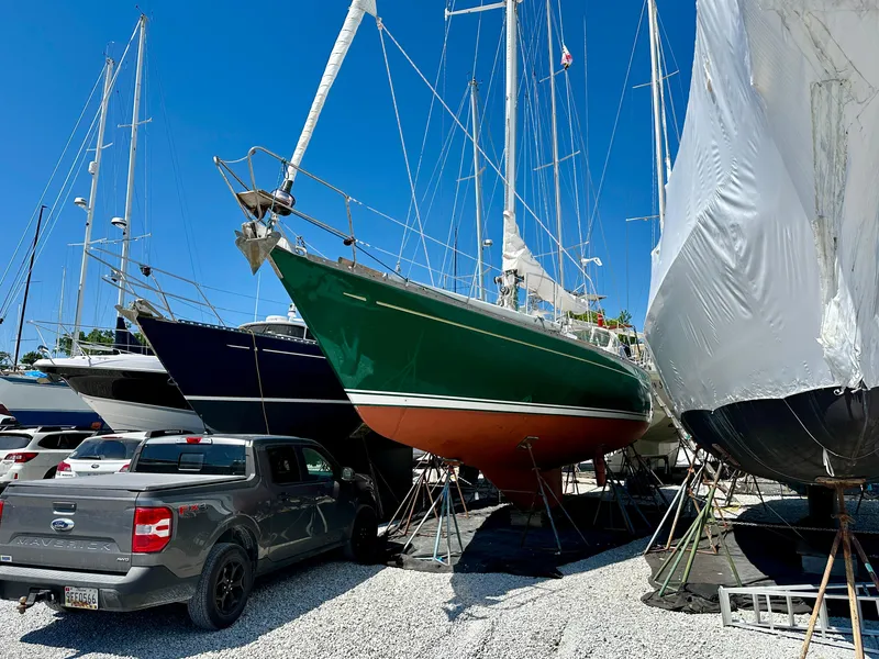 Slide: The Image of Alden 44 sailboat from 1980 in dry dock with other boats. - 5
