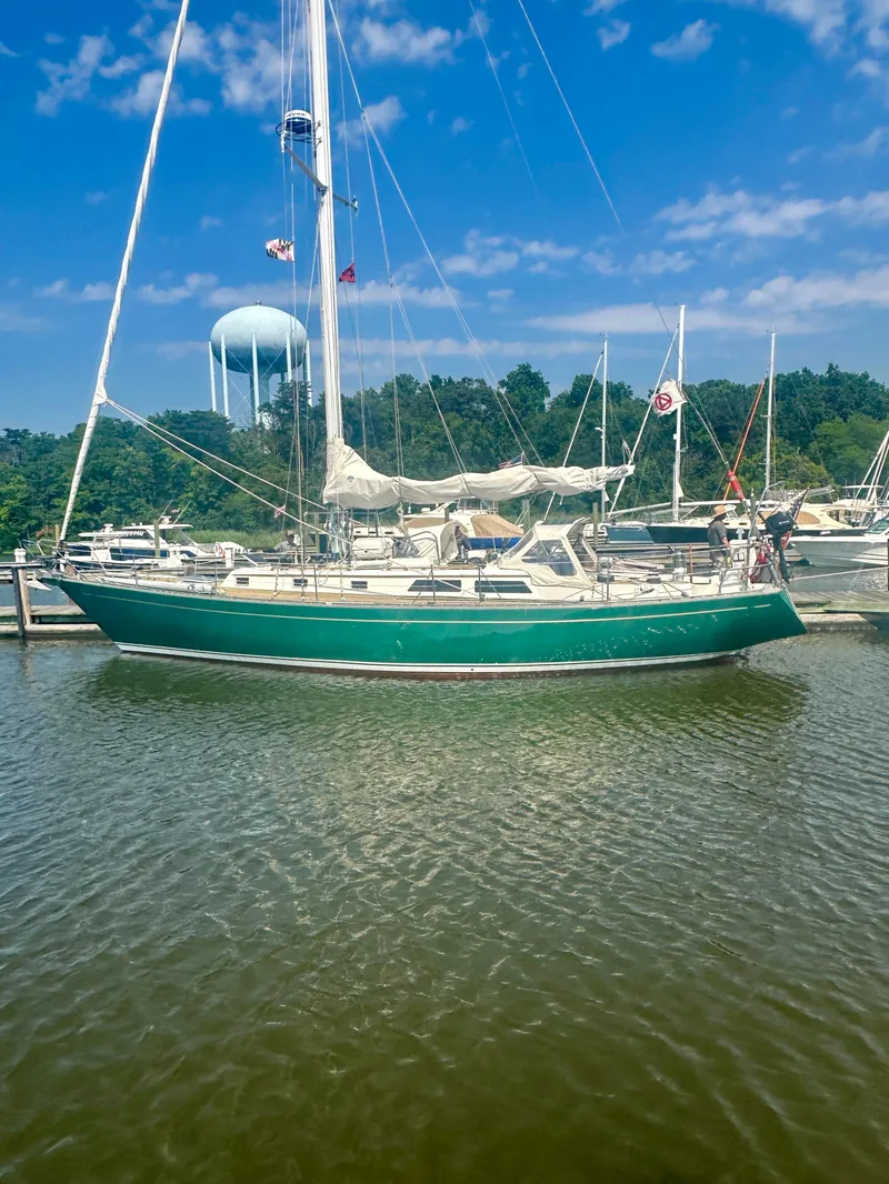 Slide: The Image of 1980 Alden 44 sailboat docked at marina on a sunny day. - 6