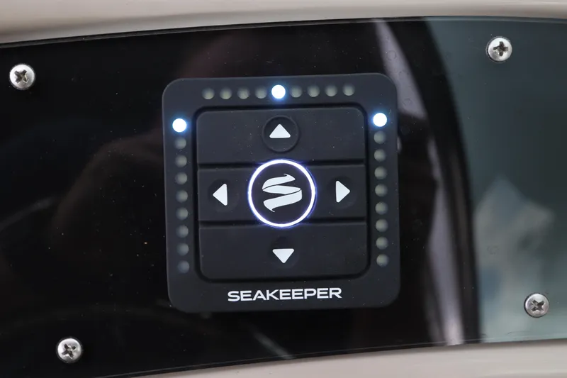 Slide: The Image of Seakeeper control panel on a 2007 Sea Ray 240 Sundeck boat. - 26