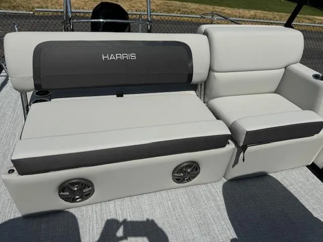 Slide: The Image of 2024 Harris Cruiser 230 boat seating with integrated speakers. - 8