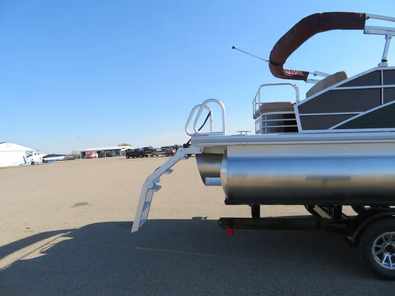 Slide: The Image of 2024 Bennington 22SXSB pontoon boat with rear boarding ladder. - 6