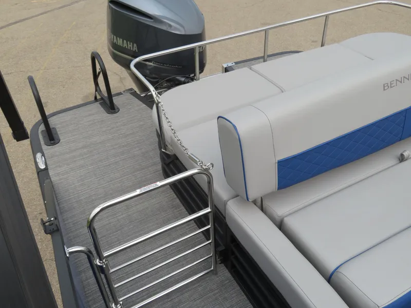 Slide: The Image of 2024 Bennington 25LTSB pontoon boat with Yamaha outboard motor and comfortable seating. - 16