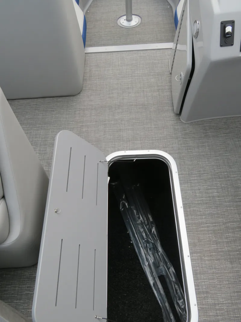 Slide: The Image of 2024 Bennington 25LTSB boat interior storage compartment. - 17