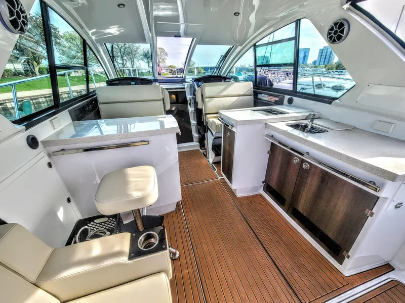 Slide: The Image of Luxurious interior of 2017 Monterey 360 Sport Coupe yacht with modern amenities and seating. - 19