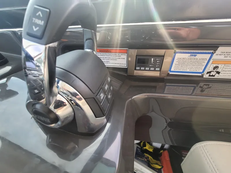 Slide: The Image of Control panel of a 2017 Monterey 360 Sport Coupe yacht with trim and certification details. - 24