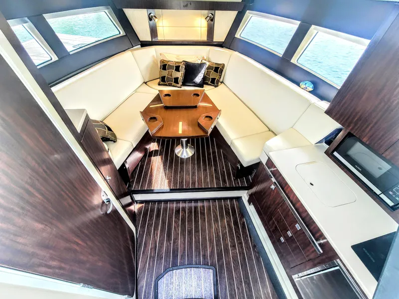 Slide: The Image of Luxurious interior of 2017 Monterey 360 Sport Coupe with elegant seating and modern amenities. - 25