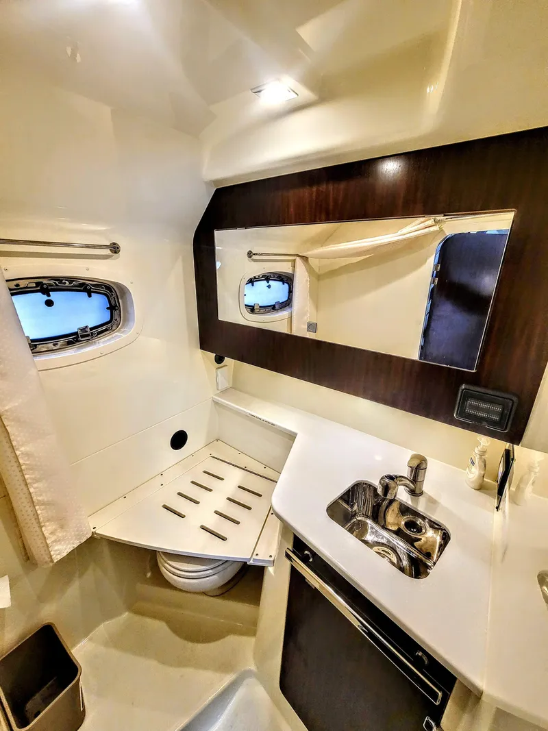 Slide: The Image of Luxurious bathroom interior of 2017 Monterey 360 Sport Coupe yacht with sink and mirror. - 30