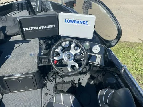 Slide: The Image of 2022 Nitro ZV21 boat dashboard with Humminbird and Lowrance navigation systems. - 8