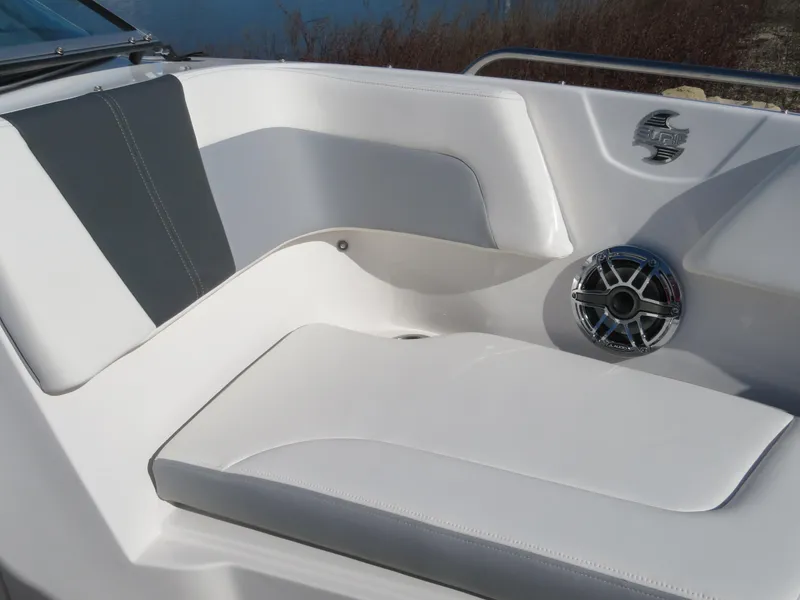 Slide: The Image of 2024 Chaparral 23 Surf boat interior seating with speaker. - 19