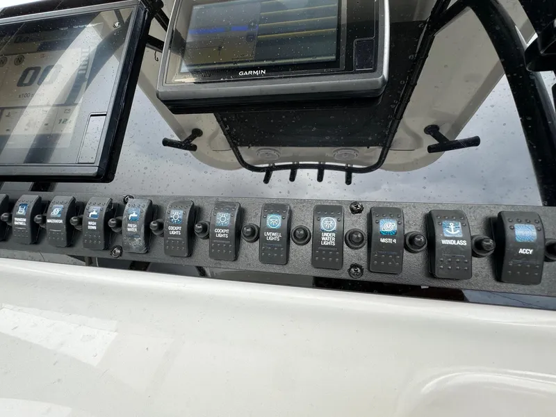 Slide: The Image of Control panel of a 2019 Sea Hunt Gamefish 27 Forward Seating boat. - 14