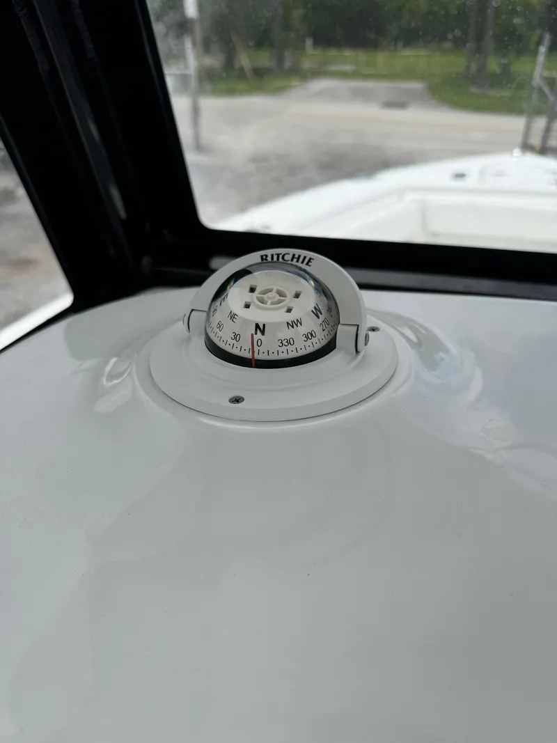 Slide: The Image of 2019 Sea Hunt Gamefish 27 Forward Seating boat compass. - 15