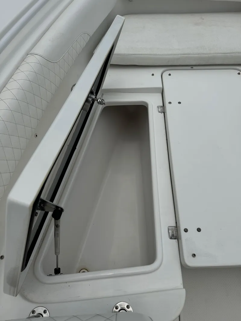 Slide: The Image of 2019 Sea Hunt Gamefish 27 Forward Seating storage compartment. - 25