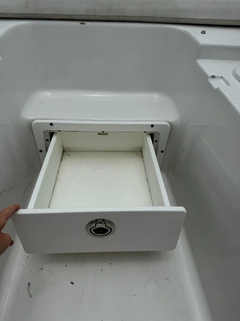 Slide: The Image of 2019 Sea Hunt Gamefish 27 Forward Seating storage compartment. - 26