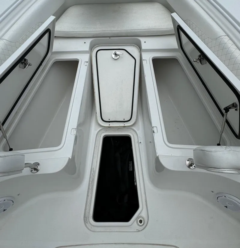 Slide: The Image of 2019 Sea Hunt Gamefish 27 Forward Seating storage compartments. - 27