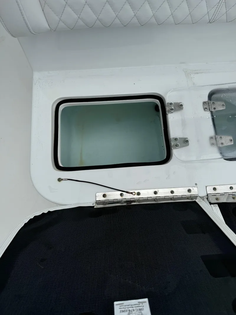 Slide: The Image of 2019 Sea Hunt Gamefish 27 Forward Seating livewell compartment. - 35