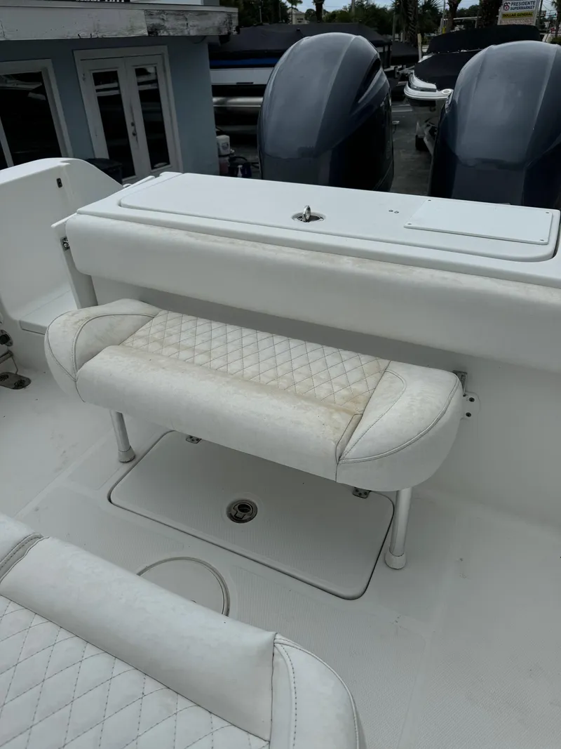 Slide: The Image of 2019 Sea Hunt Gamefish 27 Forward Seating boat with dual outboard motors. - 37
