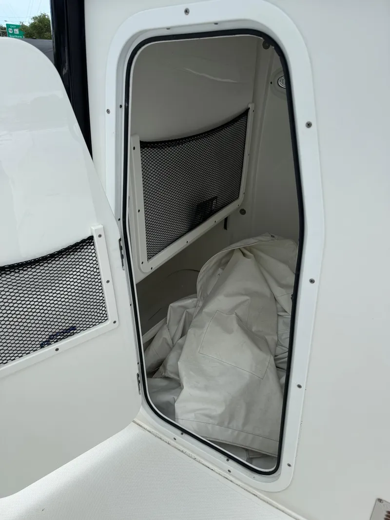 Slide: The Image of 2019 Sea Hunt Gamefish 27 Forward Seating storage compartment. - 40