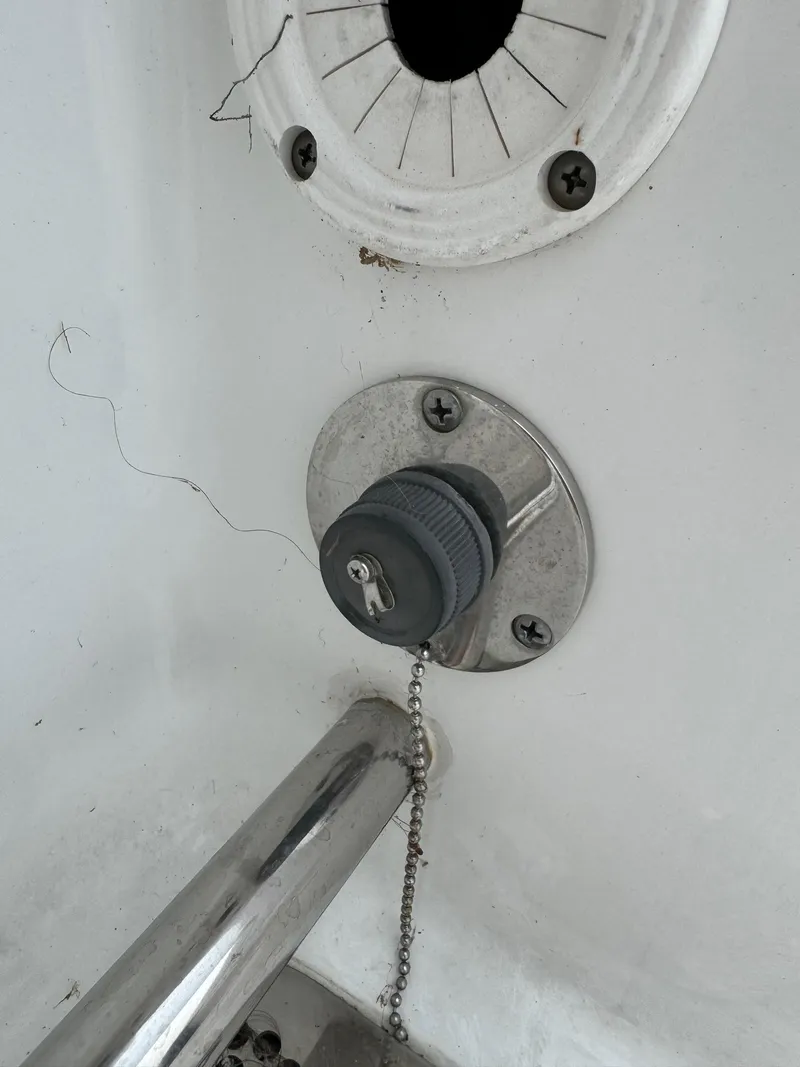 Slide: The Image of 2019 Sea Hunt Gamefish 27 Forward Seating boat detail, close-up of a plug and socket. - 44