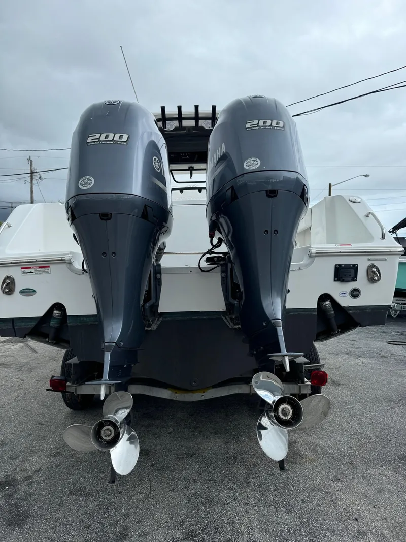 Slide: The Image of 2019 Sea Hunt Gamefish 27 Forward Seating with twin 200 HP outboard motors. - 47