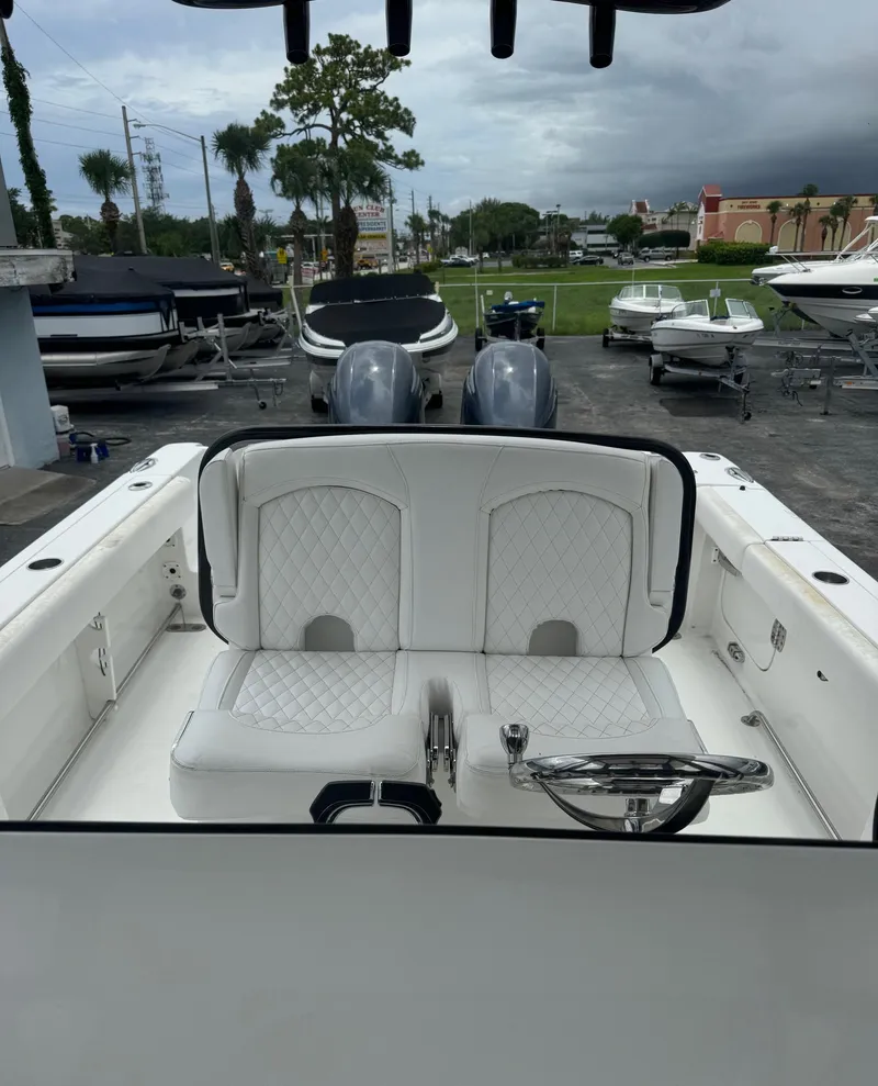 Slide: The Image of 2019 Sea Hunt Gamefish 27 Forward Seating boat with dual engines. - 8