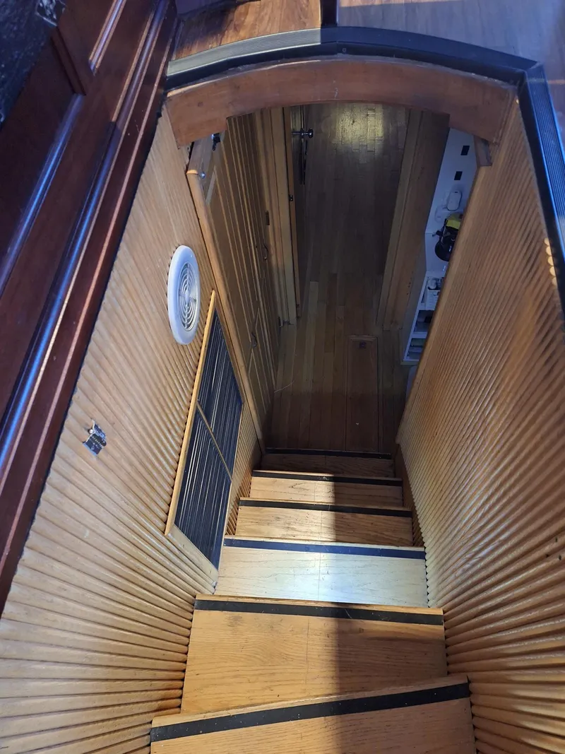 Slide: The Image of 1988 Viking Motor Yacht interior wooden staircase - 16