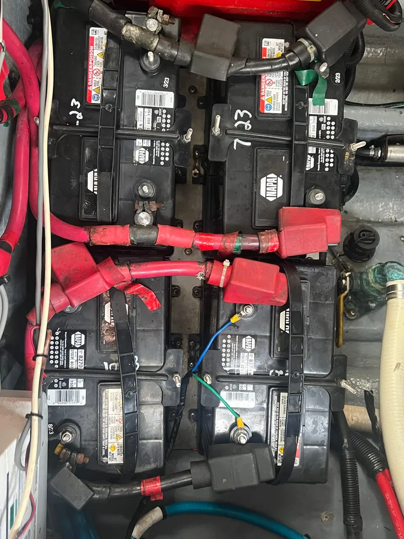 Slide: The Image of Battery compartment of a 2002 Sea Ray 300 Sundancer boat. - 29