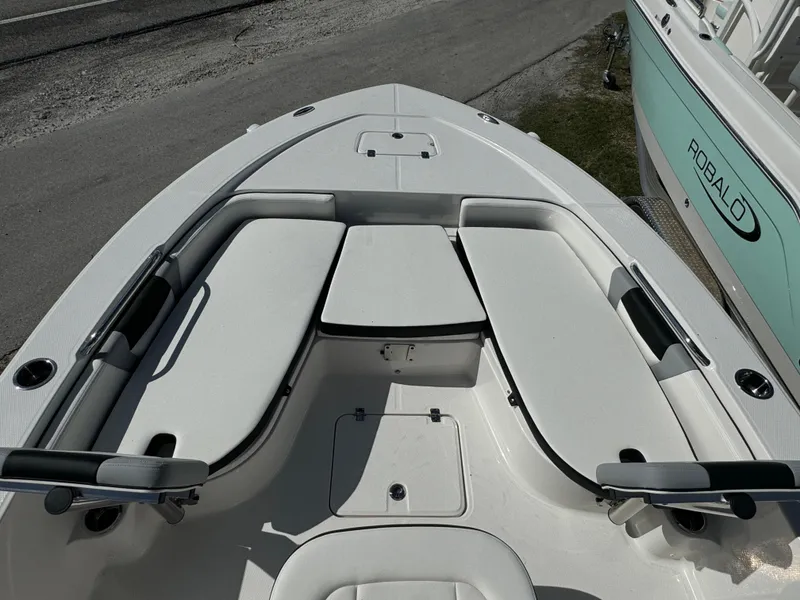 Slide: The Image of 2024 Robalo 226 Cayman boat with spacious seating and sleek design. - 17
