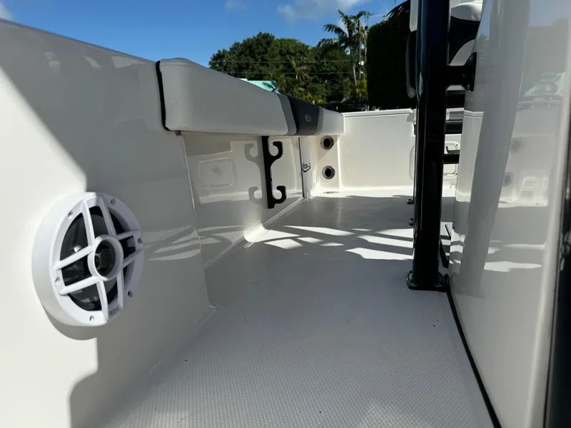 Slide: The Image of 2024 Robalo 226 Cayman boat interior with speaker and seating detail. - 20