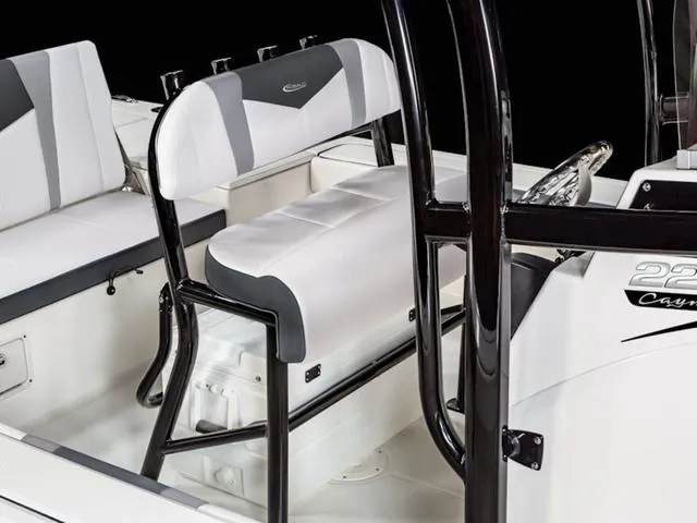 Slide: The Image of 2024 Robalo 226 Cayman boat interior with white and gray seating. - 35