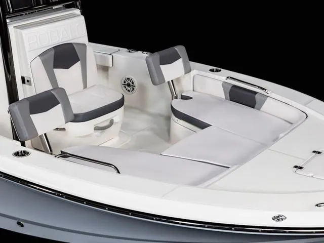 Slide: The Image of 2024 Robalo 226 Cayman boat interior with cushioned seating. - 37