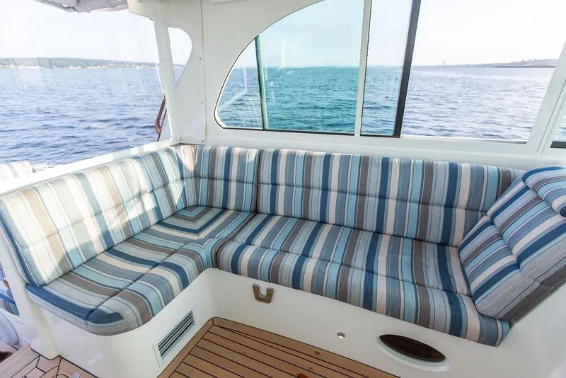 Slide: The Image of Hinckley Sport Boat 40 X 2022 control panel with joystick and throttle. - 16