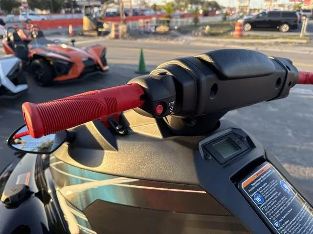 Slide: The Image of 2024 Yamaha Marine Waverunner EX SPORT, black/cyan, handlebar and controls close-up. - 11