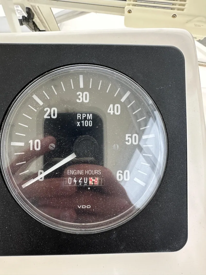 Slide: The Image of Close-up of 2006 Carolina Classic 28FT boat tachometer showing 448.1 engine hours. - 5