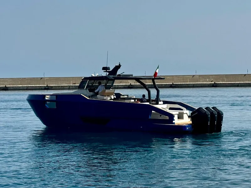 Slide: The Image of Aicon Audace 50 yacht, 2025 model, cruising in a calm harbor. - 22