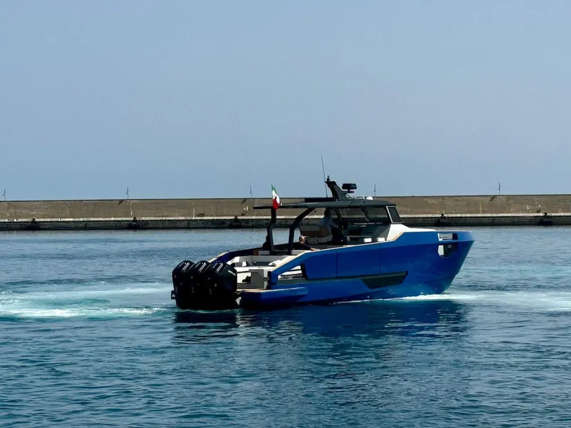 Slide: The Image of Aicon Audace 50 yacht, 2025 model, cruising in a harbor. - 29