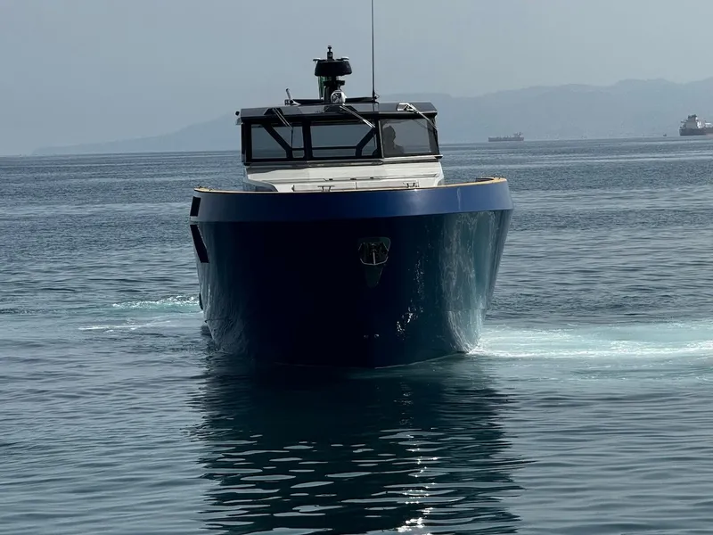 Slide: The Image of Aicon Audace 50 yacht, 2025 model, cruising on calm waters. - 7