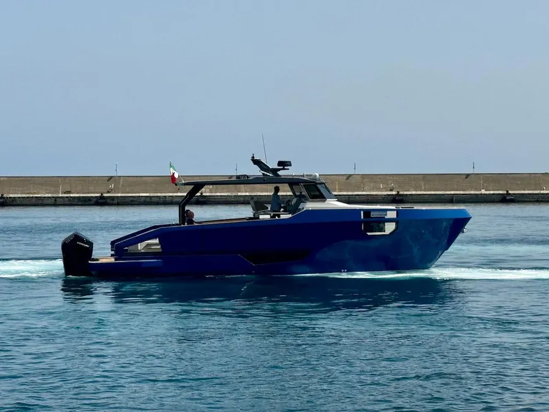 The Image of Aicon Audace 50 yacht, 2025 model, cruising in a harbor with a clear sky. - 0