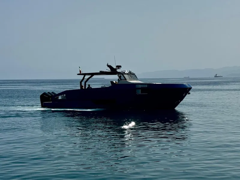 Slide: The Image of 2025 Aicon Audace 50 yacht cruising on calm sea waters. - 12