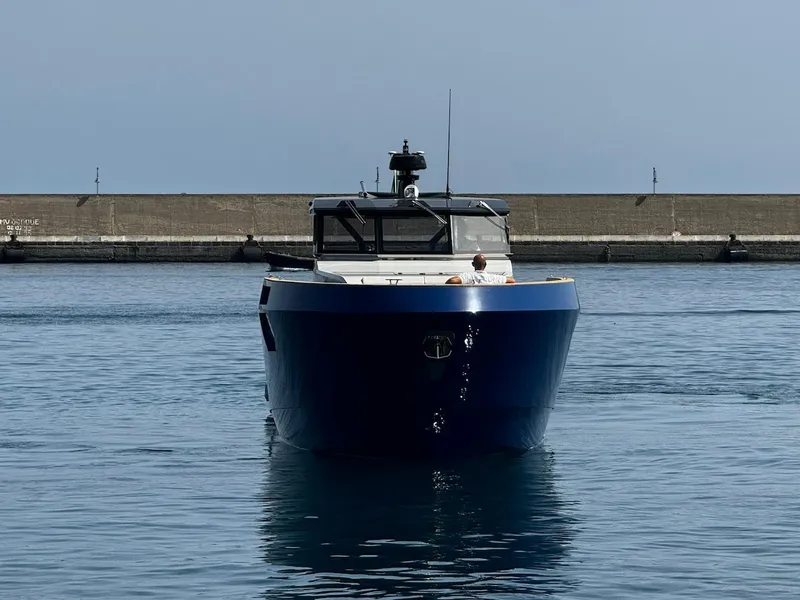 Slide: The Image of 2025 Aicon Audace 50 yacht in harbor, front view, calm water. - 13
