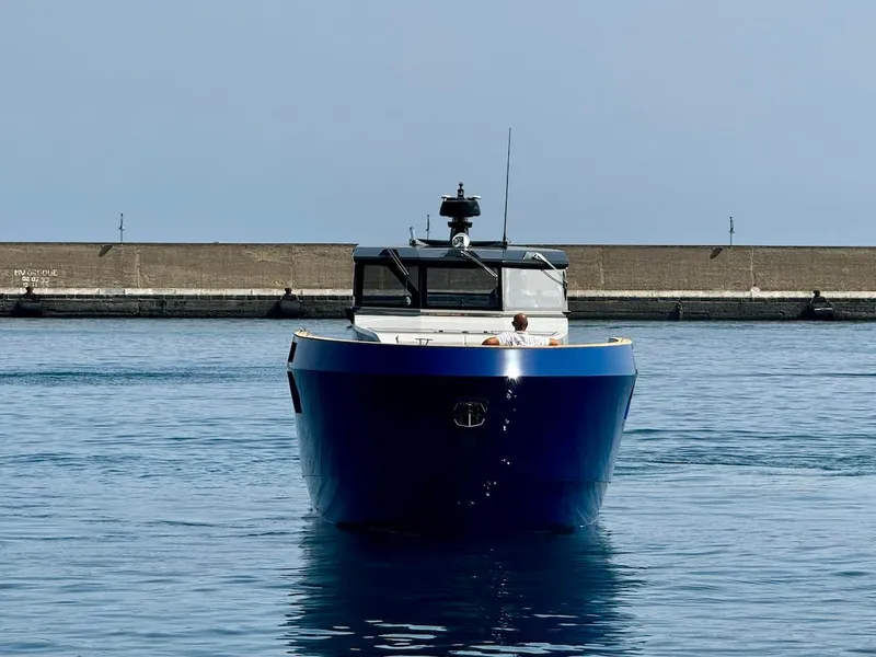 Slide: The Image of Front view of 2025 Aicon Audace 50 yacht in calm waters. - 14