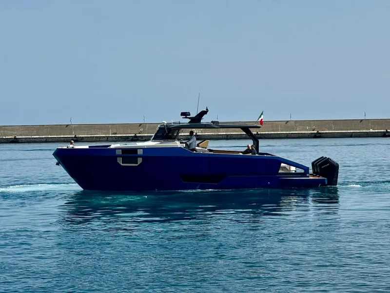 Slide: The Image of Aicon Audace 50 yacht, 2025 model, cruising in a calm harbor. - 18