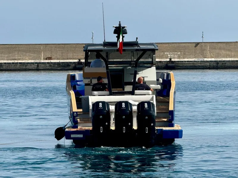 Slide: The Image of Aicon Audace 50 yacht, 2025 model, cruising in a harbor. - 26