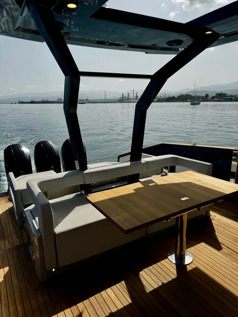 Slide: The Image of Luxury Aicon Audace 50 yacht interior, 2025 model, with sleek design and scenic ocean view. - 39