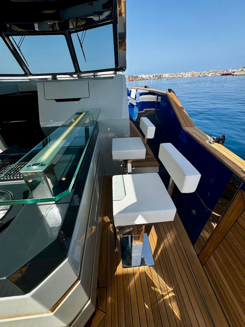Slide: The Image of 2025 Aicon Audace 50 yacht with sleek deck and modern seating. - 48