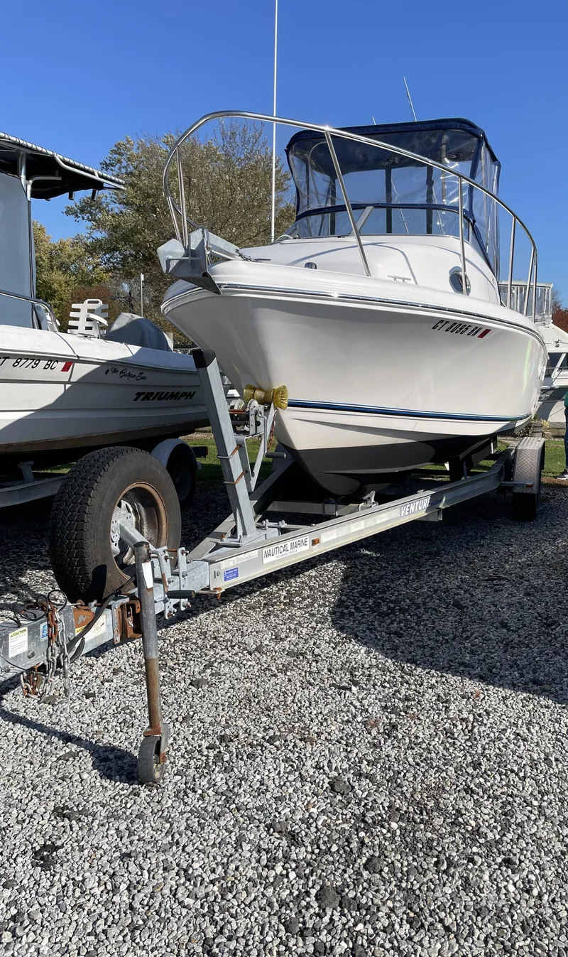 Slide: The Image of 2015 Pro-Line 20 Express Cuddy boat on a trailer. - 12