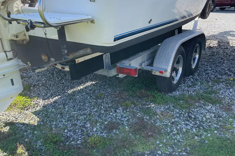 Slide: The Image of 2015 Pro-Line 20 Express Cuddy boat on a dual-axle trailer. - 5