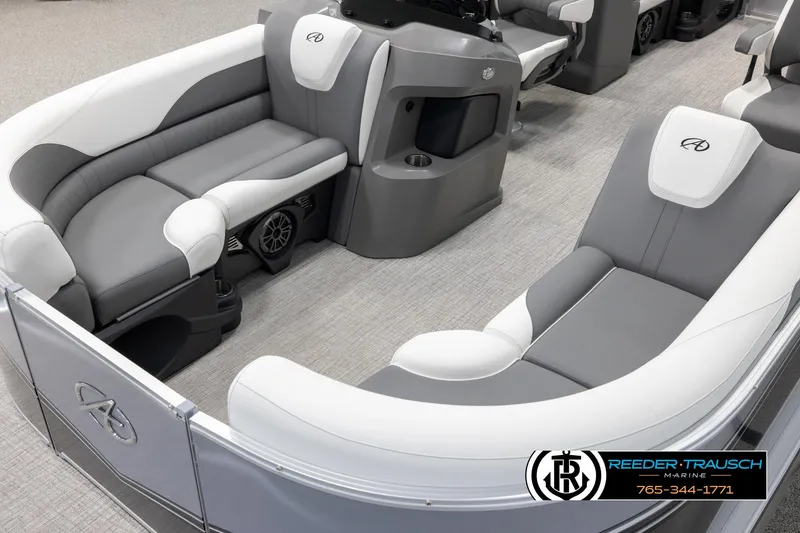 Slide: The Image of 2024 Avalon LSZ QL pontoon boat interior with gray and white seating. - 10